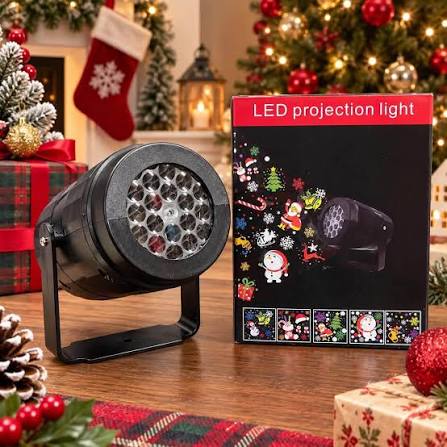 Proyector navideño junto a su caja